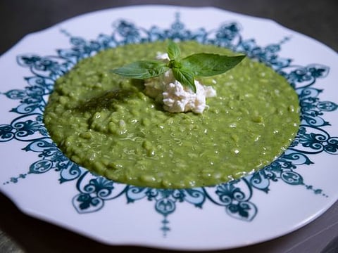 Watch how to make basil pesto risotto with burrata cheese