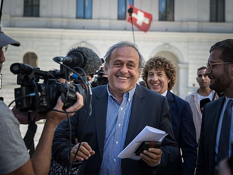 Michel Platini, French football legend and former Uefa president, wears a smile of relief outside the Swiss court in Bellinzona, Switzerland after he and Sepp Blatter were cleared of fraud charges.
