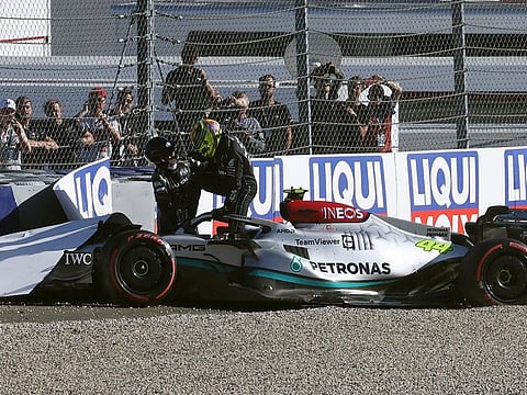 Lewis Hamilton coming out of his car after the crash during qualifying for the sprint race of F1 Austrian GP on Friday.