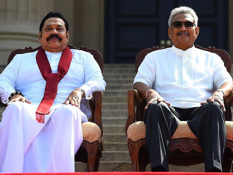 Rajapaksa (right) and his then Prime Minister brother Mahinda Rajapaksa pose for a group photograph in a file photo.