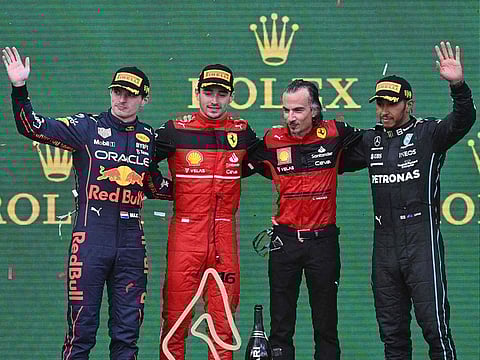 From left: Max Verstappen, Charles Leclerc, Ferrari's French engineer Laurent Mekies and Lewis Hamilton celebrate on the podium after the Austrian Grand Prix at the Red Bull Ring on Sunday