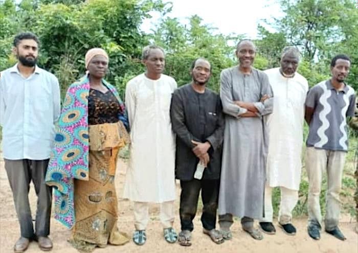 Pakistani citizen Dr Abuzar Muhammad Afzal (extreme left) has been freed more than 100 days after being kidnapped by militants in Nigeria. Image Credit - Nigerian media-1657538959344