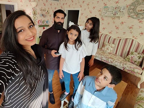 Rasminah Usman with her husband and three children.