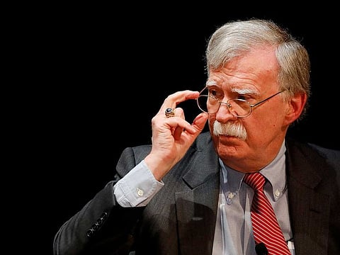 Former US national security advisor John Bolton adjusts his glasses during a lecture at Duke University in Durham, North Carolina, US, February 17, 2020.   