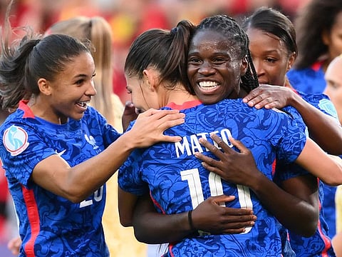 France's defender Griedge Mbock Bathy (centre) celebrates with teammates after scoring her team's second goal during the Uefa Women's Euro 2022 match on Thursday.
