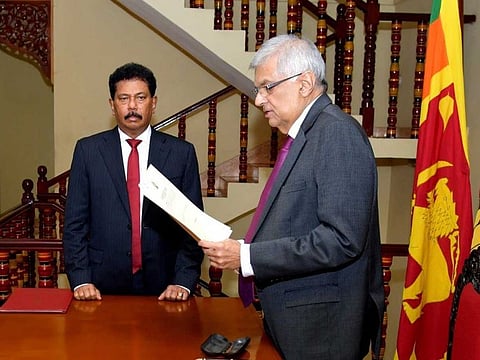 Prime Minister Ranil Wickremesinghe takes oath as the interim president of Sri Lanka in Colombo on July 15, 2022. He will remain interim president until Parliament elects a successor to Gotabaya Rajapaksa, who resigned after mass protests over the country’s economic collapse forced him from office. 