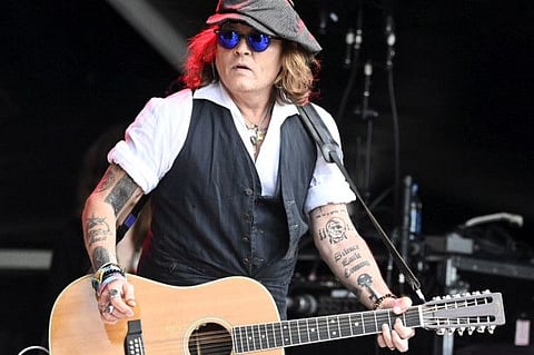 On June 19, 2022 Johnny Depp performs on stage with Jeff Beck during the Helsinki Blues Festival in Helsinki.