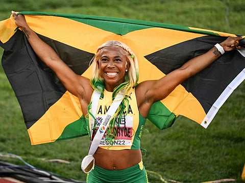 Jamaica's Shelly-Ann Fraser-Pryce celebrates winning the women's 100m final during the World Athletics Championships at Hayward Field in Eugene, Oregon.