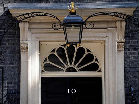 A photograph taken on July 18, 2022 shows the entrance door of 10 Downing Street, in central London.