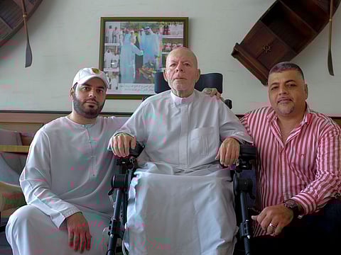 Radwan Osman Al Tamimi (centre), owner of Bu Tafish restaurant with his sons Wael Radwan Al Tamimi (right) and Raed Radwan Al Tamimi (left) at the Bateen Marina branch.