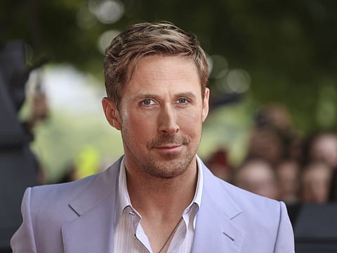 Ryan Gosling poses for photographers upon arrival at the screening of the film 'The Gray Man' in London, Tuesday, July 19, 2022.
