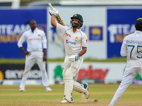 Pakistans Abdullah Shafique (centre) celebrates after guiding Pakistan to a four-wicket win on the final day of the first Test in Galle on Wednesday.
