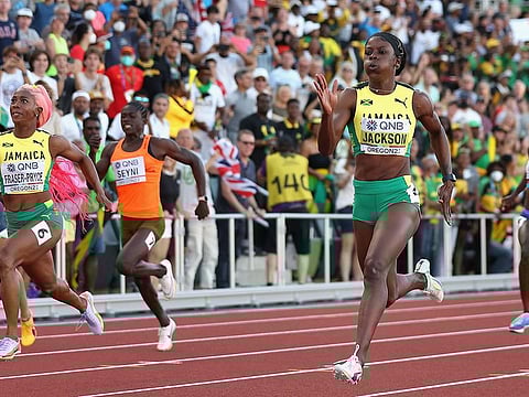  Shericka Jackson of Team Jamaica (closer to camera) pipped compatriot Shelly-Ann Fraser-Pryce in the women's 200m final on Thursday.