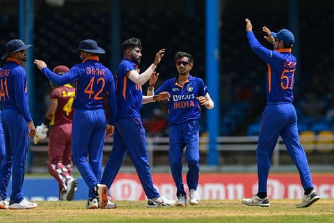 Mohammed Siraj (third right) and Yuzvendra Chahal (second right) of India celebrate the dismissal of Shai Hope (third left) of West Indies during the 1st ODI match at Queens Park Oval, Port of Spain, Trinidad and Tobago.