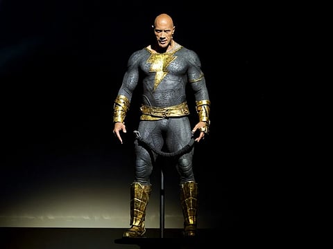 Dwayne Johnson speaks onstage at the Warner Bros. theatrical session with "Black Adam" and "Shazam: Fury of the Gods" panel during 2022 Comic Con International: San Diego at San Diego Convention Center on July 23, 2022 in San Diego, California. 