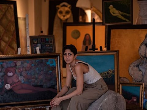 Hana Afifi exhibits and sells her art at home. 