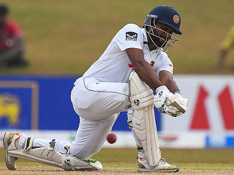 Sri Lankan captain Dimuth Karunaratne battled a back pain to help his side build on the overall lead against Pakistan on third day at Galle. 
