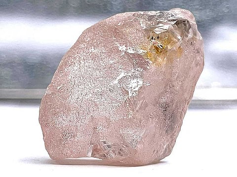 This undated handout picture released by Lucapa Diamond Company Limited on July 27, 2022 shows a 170 carat pink diamond - dubbed The Lulo Rose -- that was discovered at the Lulo mine in Angola's diamond-rich northeast region. 