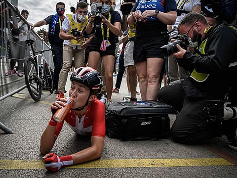 FDJ Suez Futuroscope's Danish rider Cecilie Ludwig celebrates after winning the 3rd stage of the new edition of the Women's Tour de France cycling race, a 133,6 km race between Reims and Epernay.