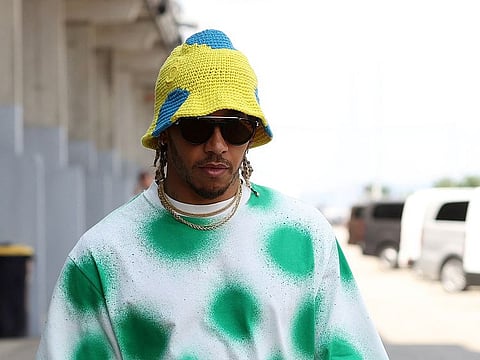 Mercedes' seven-time world champion Lewis Hamilton makes a style statement ahead of the Hungarian Grand Prix on Thursday.