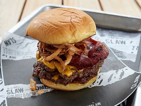 Watch how to make a juicy beef barbecue bacon cheeseburger