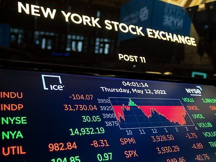 File photo:  Screens display end-of-day trading results at the New York Stock Exchange.  