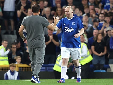 Everton manager Frank Lampard (left) with fundraiser for Ukraine Paul Stratton after the match.