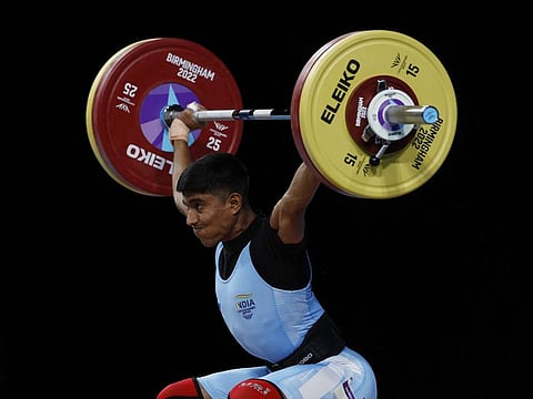 India's Sanket Mahadev Sargar in action during the Commonwealth Games Men's 55kg Weightlifting Final at The NEC Hall 1, Birmingham, Britain.