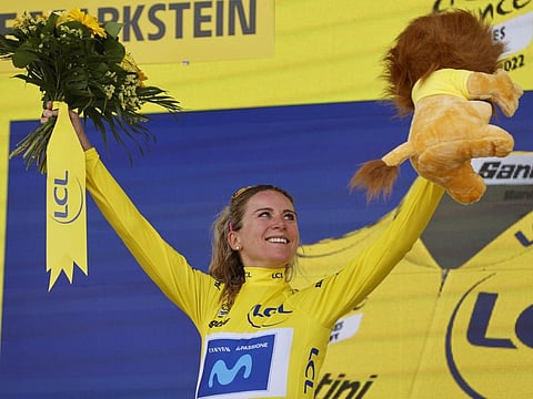 Netherland's Annemiek Van Vleuten wearing yellow jersey celebrates on the podium after winning in Le Markstein Fellering, eastern France after the 7th stage of the Tour de France women's cycling race over 127.5 kms from Selestat to Le Markstein Fellering.