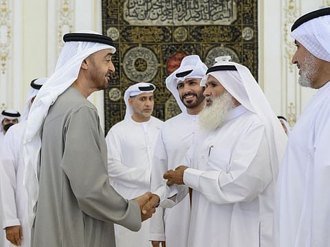 Sheikh Mohamed with poet Musaed bin Tasas Al Harthy, winner of the Million’s Poet title, at Qasr Al Bahr Majlis.