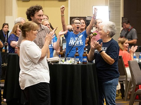Abortion-rights supporters rejoice as early polls indicate the proposed constitutional amendment in Kansas has not passed late Tuesday, August 2, 2022, at a Kansans for Constitutional Freedom election watch party at the Overland Park Convention Center in Overland Park.  