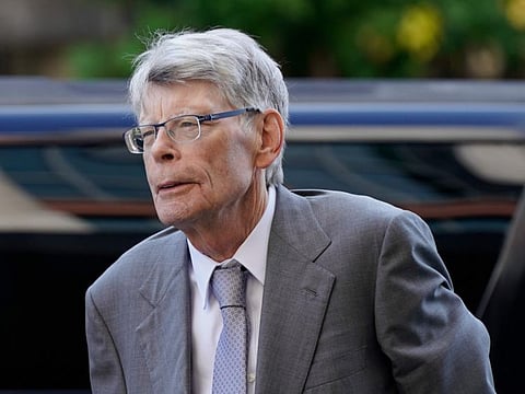 Author Stephen King arrives at federal court before testifying for the Department of Justice as it bids to block the proposed merger of two of the world's biggest publishers, Penguin Random House and Simon & Schuster, Tuesday, August 2, 2022, in Washington.