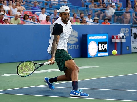 Nick Kyrgios, of Australia, prepares to hit a return to Marcos Giron, of the United States, at the Citi Open tennis tournament in Washington.
