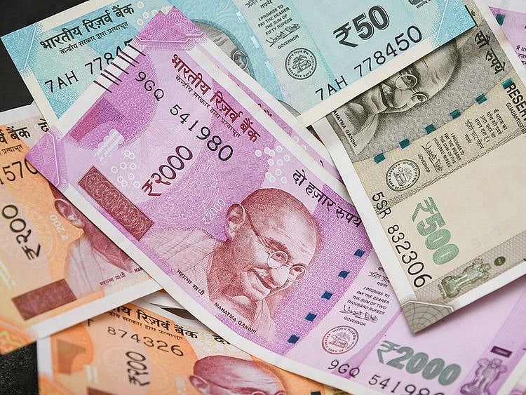 Indian rupee set to trade near historic low in coming three months