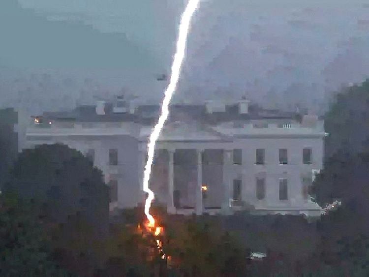 A lightning strike hits a tree in Lafayette Park across from the White House