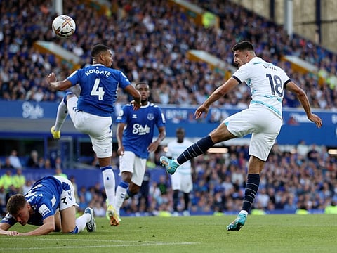 Chelsea's Armando Broja (right) heads at goal against Everton at Goodison Park during the Premier League clash.
