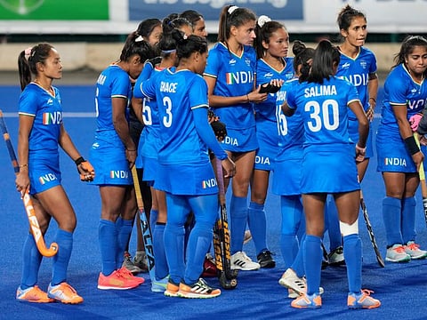 Indian players react after their loss in the women's semifinal hockey match against Australia at the Commonwealth Games in Birmingham, England.