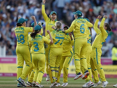 Australian players celebrate their victory in the gold medal match against India at Edgbaston, capping a stellar campaign in the Commonwealth Games Women’s Cricket T20 competition.