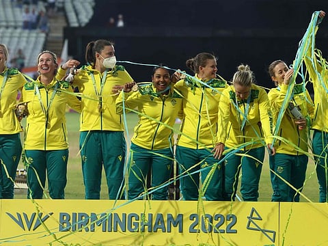 Gold medalists team Australia stand on the podium during the medal ceremony for the women's Twenty20 Cricket on day ten of the Commonwealth Games at Edgbaston in Birmingham, central England.