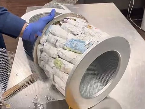An inbound passenger arriving from an African country was attempting to smuggle in marijuana by stashing them in inside cylindrical vehicle engine air filters.