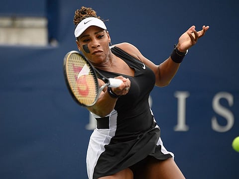 Serena Williams, of the United States, returns the ball during a match with Nuria Parrizas-Diaz, of Spain, during the National Bank Open tennis tournament in Toronto.