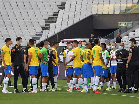Employees of the National Health Surveillance Agency (Anvisa) on the field on September 05, 2021, during the South American qualifier for the FIFA World Cup Qatar 2022 between Brazil and Argentina at the Neo Quimica Arena in Sao Paulo, Brazil. 