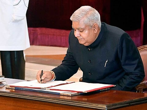 Jagdeep Dhankar signs a register after taking oath as 14th Vice President of India at Rashtrapati Bhawan, in New Delhi on Thursday, August 11, 2022. 