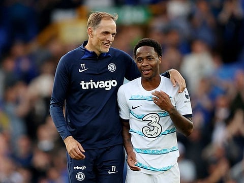 Chelsea manager Thomas Tuchel (left) with Raheem Sterling.