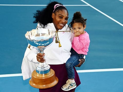 Serena Williams with her daughter Alexis Olympia Ohanian Jr, and the ASB trophy after winning the final against Jessica Pegula at the ASB Classic in Auckland, New Zealand, on January 12, 2020. “...these days, if I have to choose between building my tennis resume and building my family, I choose the latter,” Williams wrote in an essay released August 9, 2022, by Vogue magazine. 