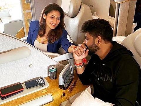Vignesh took to Instagram to share two photos in which the lovely couple can be seen enjoying their time on a plane. 