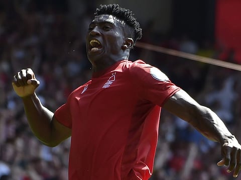 Nottingham Forest's Taiwo Awoniyi celebrates after scoring against West Ham during the English Premier League match at the City ground in Nottingham, England.