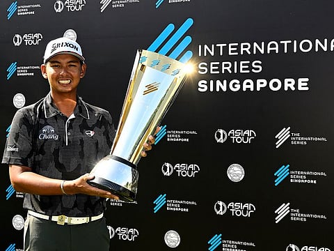 Champion Nitithorn Thippong with the International Series Singapore Trophy.