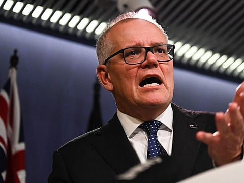 Australia's former prime minister Scott Morrison speaks to media during a press conference in Sydney on August 17, 2022. 