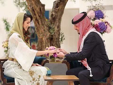Crown Prince Hussein bin Abdullah II with Rajwa Khalid Al Saif during the engagement ceremony in Riyadh on Wednesday.